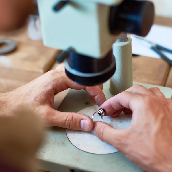 appraiser inspecting ring
